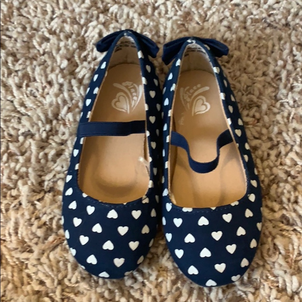 Navy with white heart slip ons
